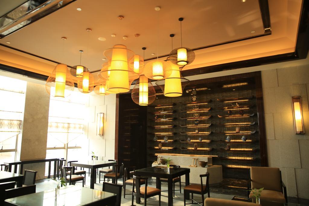 Ramada Yiyang Taojiang Hotel Екстериор снимка